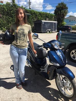 Another Happy Vespa Orlando Customer